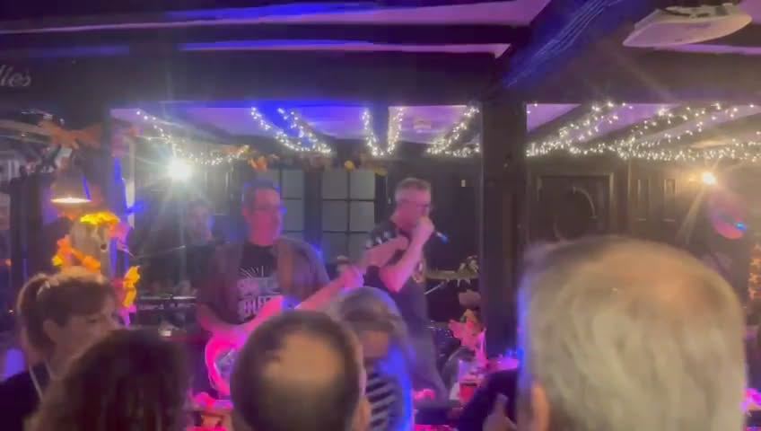 A packed back room